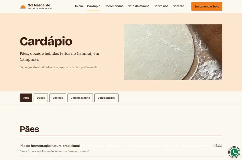 Cardápio do site da Padaria Sol Nascente no computador: título "Cardápio", abas de categorias (pães, doces, bebidas, café da manhã e bolos inteiros) e o início da lista de pães.